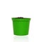Green little pot and handful soil for growing plant