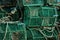 Green Lobster cages drying on shore