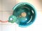 Green LPG cooking gas tank or propane tank with safety valve and