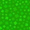 Green lucky clover leaves background. Seamless vector pattern