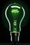 Green Luminous Glow: Green Light Bulb on Deep Black