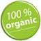 green magnet with text 100% organic