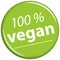 green magnet with text 100% vegan