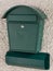 Green mailbox and newspaper holder