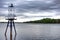 Green Maritime Navigation Beacon Light on River