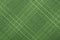 Green material in geometric patterns, a background