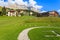 Green meadow in San Cassiano village, Dolomites Mountains, Italy