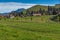 Green meadows and mountain houses above Lake Lucerne, near mount Rigi, Switzerland