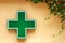 Green medical cross sign