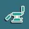 Green Medical dental chair icon isolated on green background. Dentist chair. Long shadow style. Vector