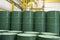 Green metal barrels