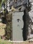 Green metal door of a bunker of WWII soldiers