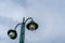 Green metal streetlamp