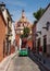 Green Mexican Taxi in Front of Parish Cathedral in San Miguel de Allende of Mexico