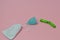 Green mint color menstrual cup and feminine hygiene tampons on white color background. female intimate hygiene period products.