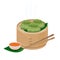 Green momo dumplings in wooden steamer basket