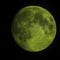 Green Moon in a spring night sky