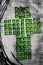 Green mosaic Christian cross