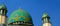 Green mosque dome photo with blue sky