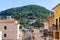 Green mountain and bright houses in Esporles, Mallorca