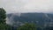 Green mountain landscape and foggy sky. Cloudy sky in mountain