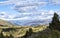 Green mountain landscape with Inca ruins of fortress Puka Pukara, Cusco Region, Peru