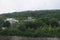 A green mountain view. The middle is the historical building of the Allan Memorial Institute,