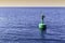 Green navigational buoy marker with solar panels