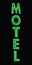 Green Neon Motel sign, lit up at night, large detailed vertical isolated closeup