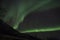 Green Northern Lights beams in Tromso