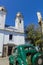 Green and obsolete car, in front of the church of Colonia del Sacramento, Uruguay. It is one of the oldest cities in Uruguay