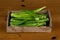 Green okra inside the box