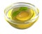 Green olive in olive oil in a transparent bowl, isolated