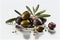 Green olives with leaves on white background. Generative Ai