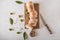 Green olives, sliced ciabatta,on a wooden board. Spice. Ciabatta