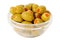 Green olives without stone in bowl. Olive filled with pepper.