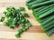 Green onion leaves on a bamboo kitchen board