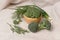 Green onions, broccoli, dill in a wooden bowl