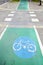 Green painted asphalt bicycle lane on a street