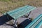 A green-painted bench with a table at the campsite