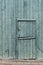 Green painted wooden Dutch Barn Door - vertical