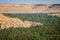 Green palm valley by river Ziz in Morocco in April 2015