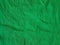 Green paper background silk surface empty blank sheets vivid color