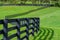 Green pastures of horse farms. Countryside spring landscape.