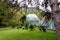 Green pavilion with hot mineral spring in Central park of Borjomi