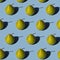 Green pears pattern on a blue background. Isometric view with hard lights