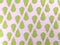 Green pears on pink food background
