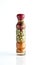 Green peas, carrots and tomatoes in decorative glass bottle for aesthetic beauty