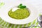 Green pease puree pudding with spinach and spices