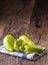 Green peper.Fresh green pepper blue checkered tablecloth on old oak table